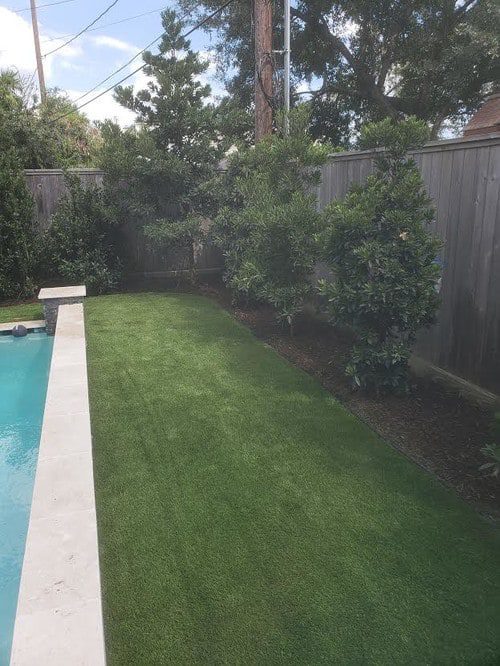 synthetic lawn installation by Helms Landscape