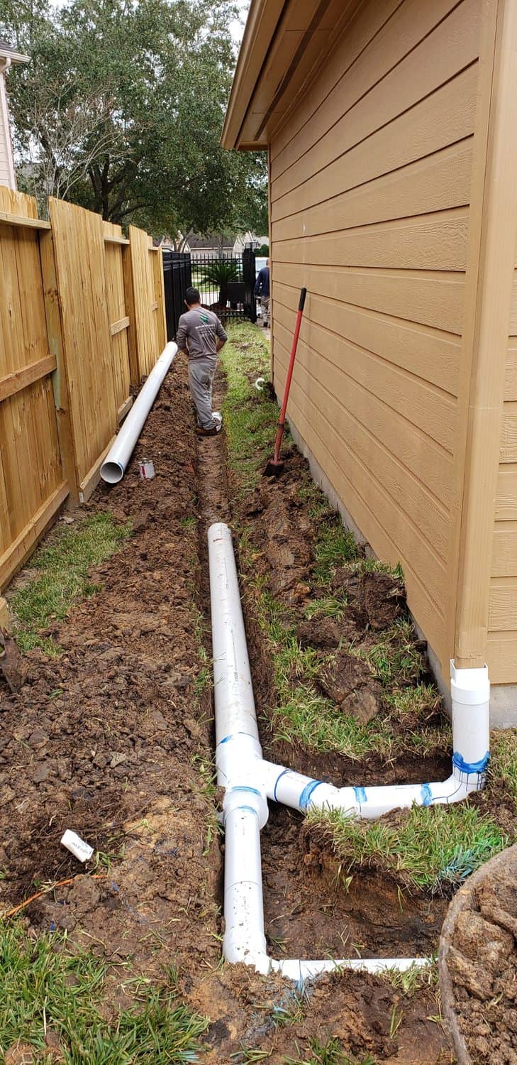 landscaping work done in Houston, Texas residence pipe trenching