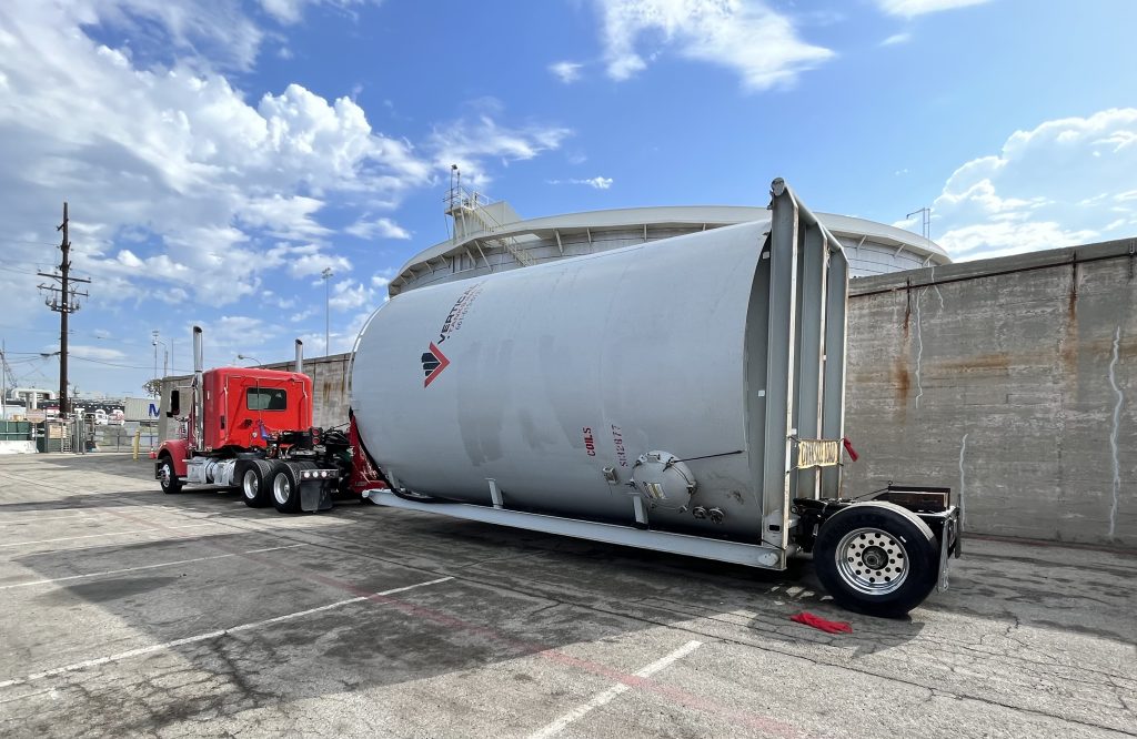 Semi trailer hauling pumps and containment equipment for fluid storage operations